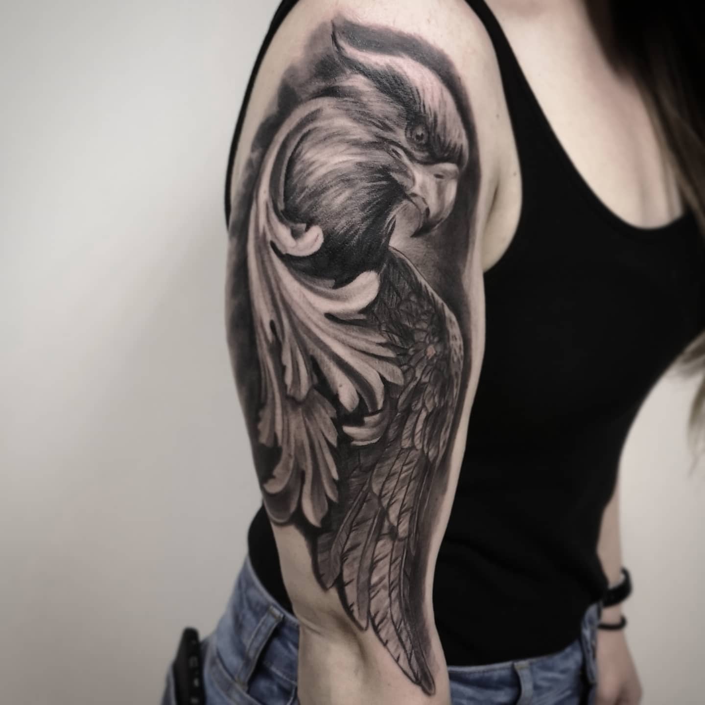 Realistic black and grey wildlife tattoo by Tomek Turlej at Studio XIII Gallery Edinburgh