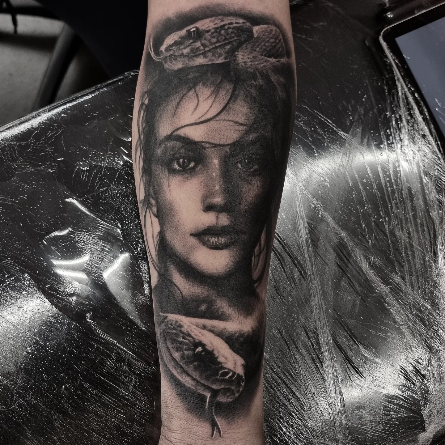 Black and grey realism portrait tattoo by Tomek Turlej, tattoo artist in Edinburgh