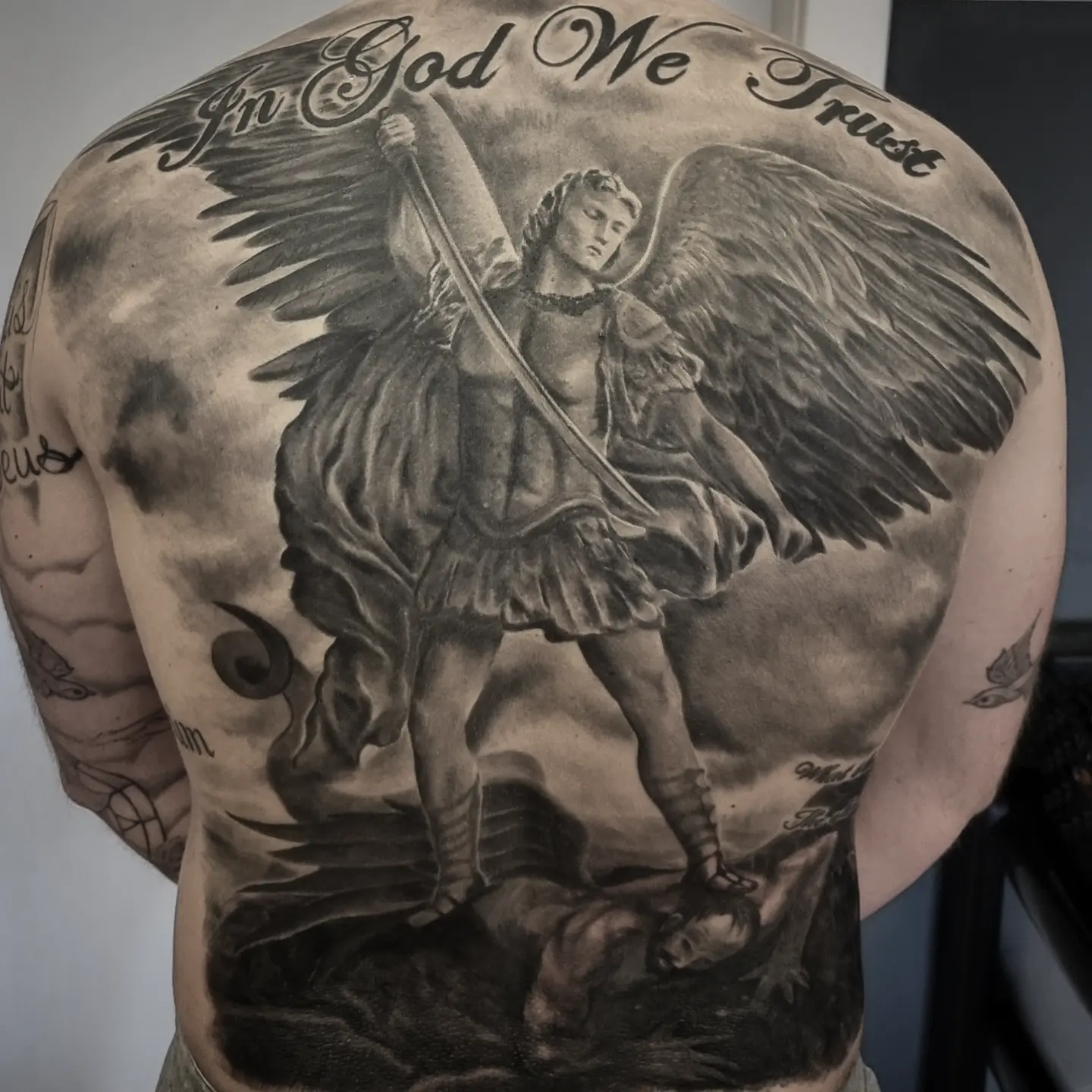 Photorealistic black and grey portrait tattoo by Tomek Turlej, Studio XIII Gallery, Scotland