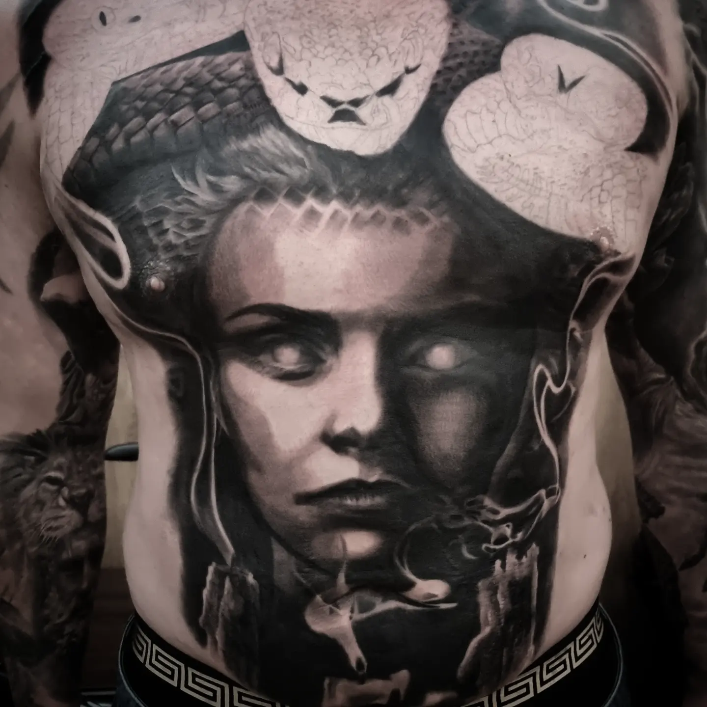 Realistic black and grey portrait tattoo healed, by Tomek Turlej at Studio XIII Gallery Edinburgh