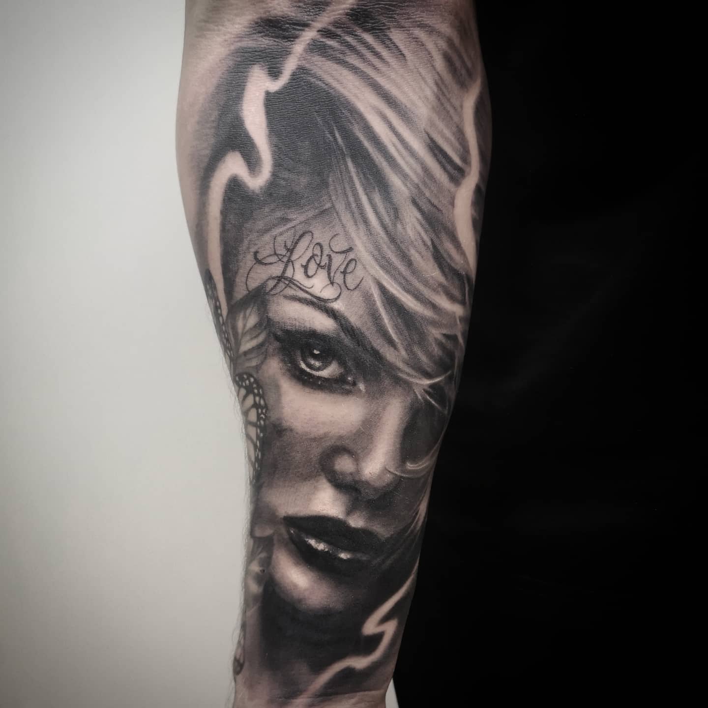 Photorealistic black and grey portrait tattoo by Tomek Turlej, Studio XIII Gallery, Scotland