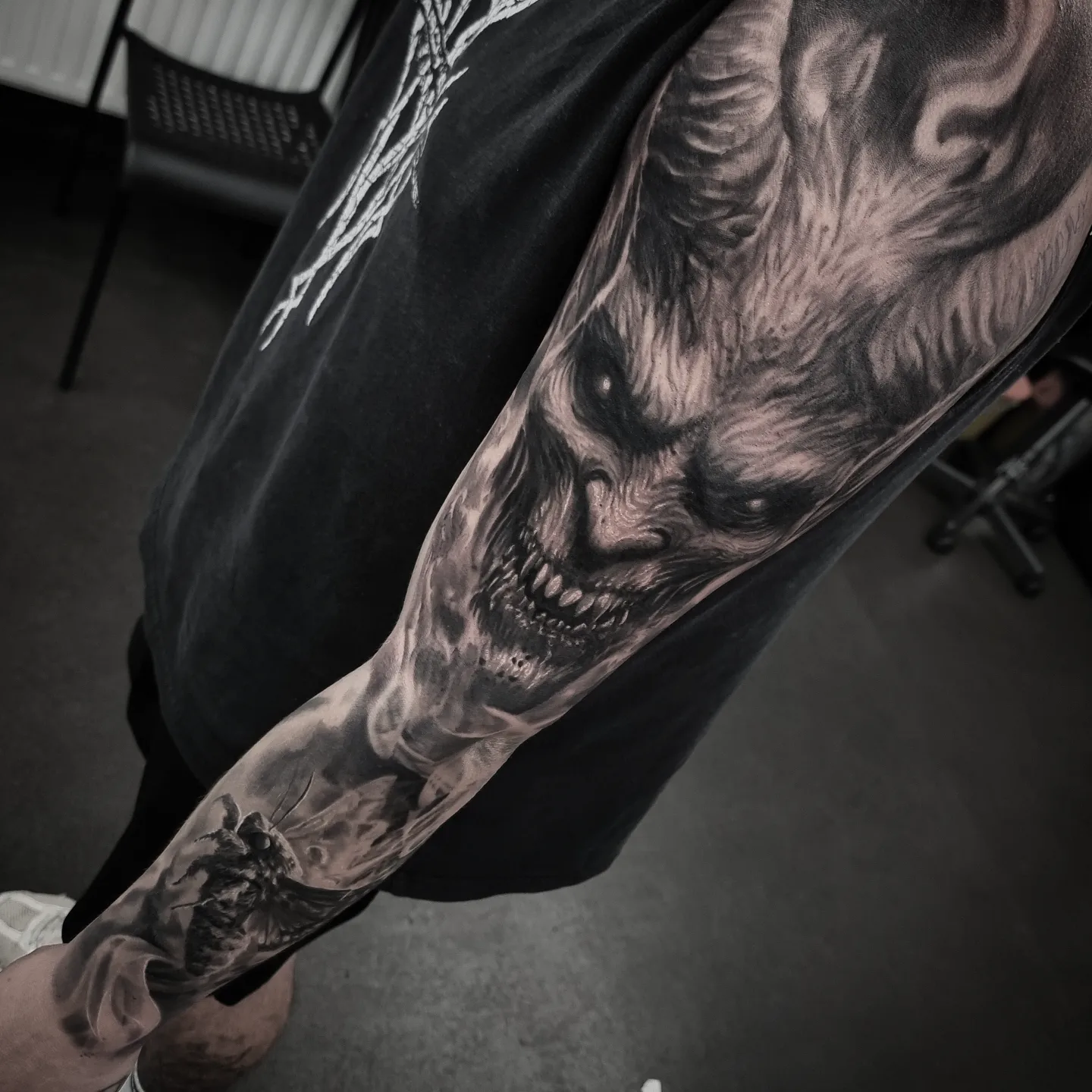 Full black and grey realism sleeve tattoo by Tomek Turlej, Edinburgh