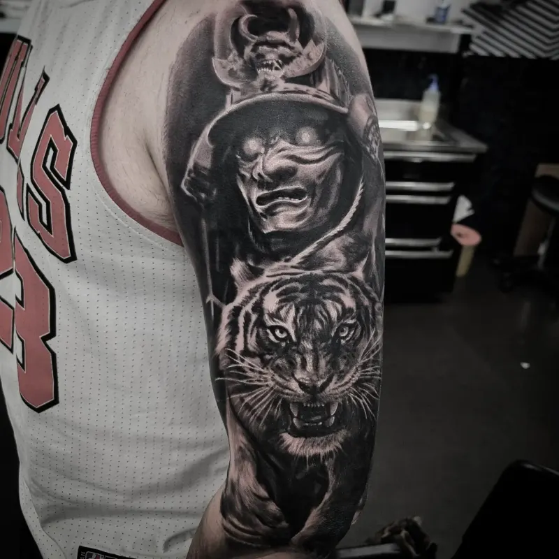Realistic black and grey wildlife tattoo by Tomek Turlej at Studio XIII Gallery Edinburgh