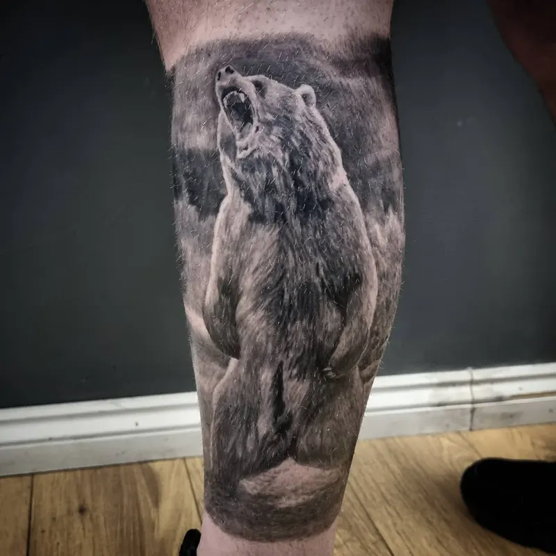 Realistic black and grey wildlife tattoo by Tomek Turlej at Studio XIII Gallery Edinburgh