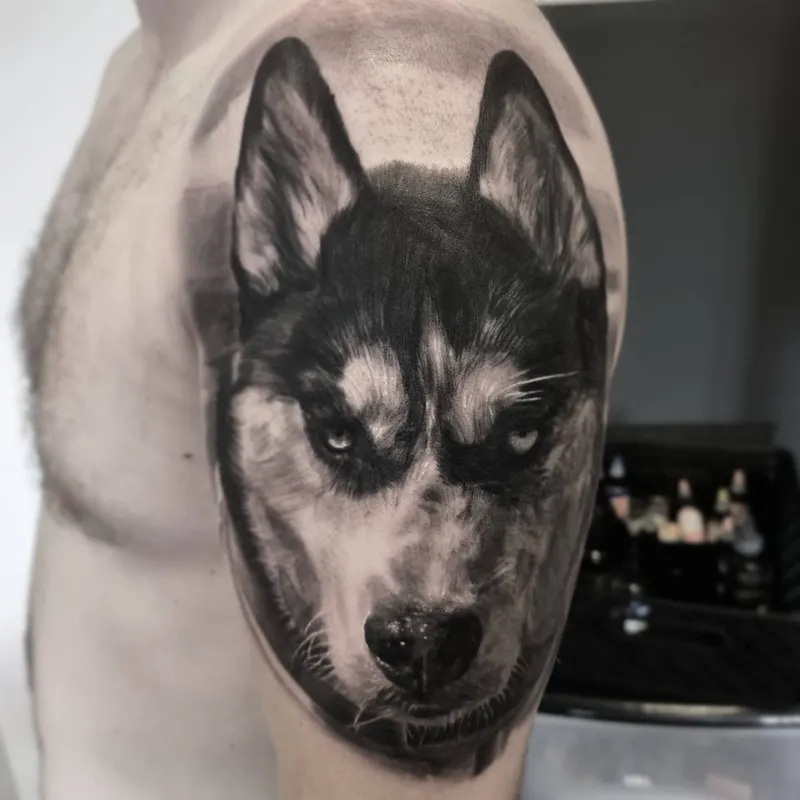 Photorealistic black and grey animal tattoo by Tomek Turlej, Studio XIII Gallery, Scotland
