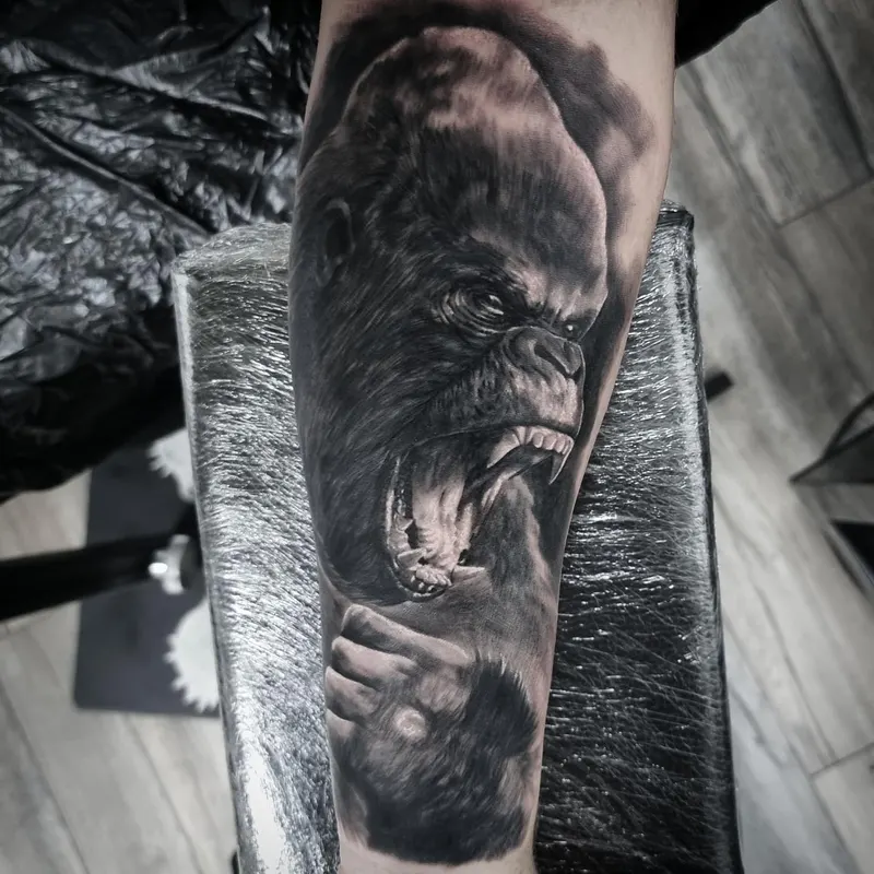 Realistic black and grey wildlife tattoo by Tomek Turlej at Studio XIII Gallery Edinburgh
