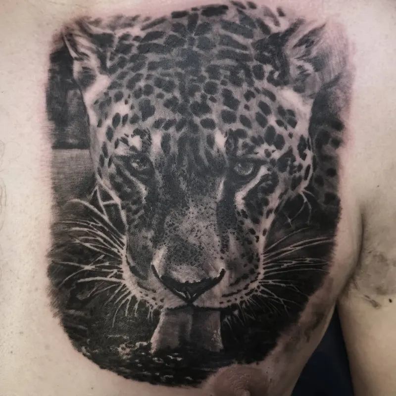Black and grey realism animal tattoo by Tomek Turlej, tattoo artist in Edinburgh