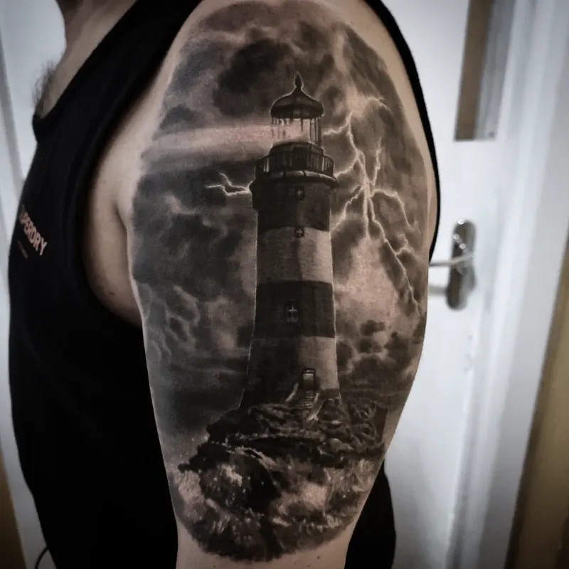 Realistic black and grey landscape tattoo by Tomek Turlej at Studio XIII Gallery Edinburgh