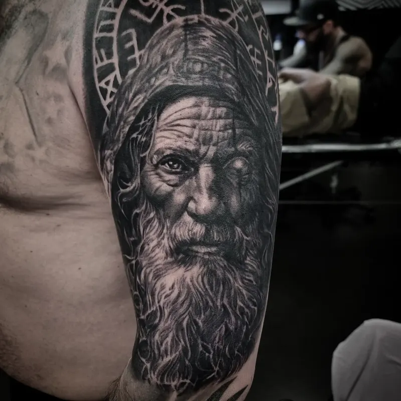 Photorealistic black and grey portrait tattoo by Tomek Turlej, Studio XIII Gallery, Scotland