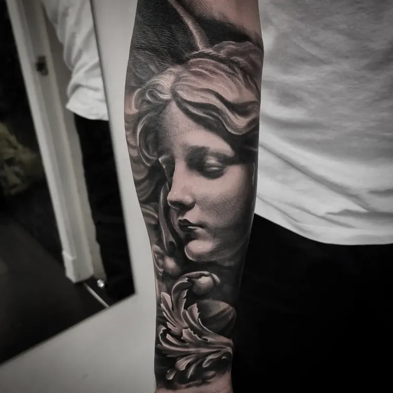 Black and grey realism portrait tattoo by Tomek Turlej, tattoo artist in Edinburgh