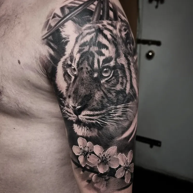 Black and grey realism portrait tattoo by Tomek Turlej, tattoo artist in Edinburgh