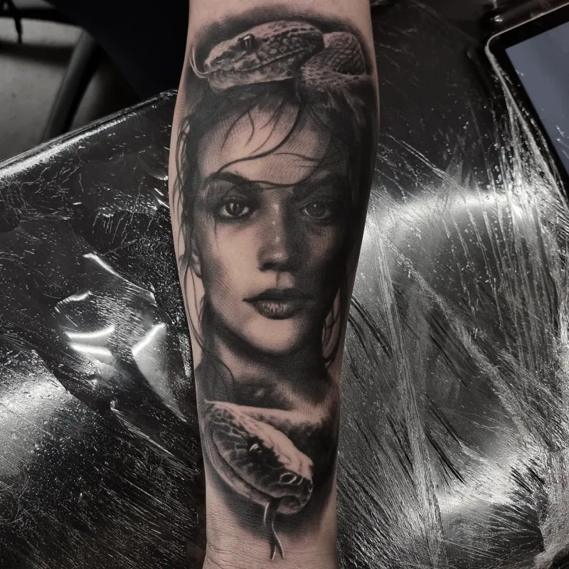 Black and grey realism portrait tattoo by Tomek Turlej, tattoo artist in Edinburgh