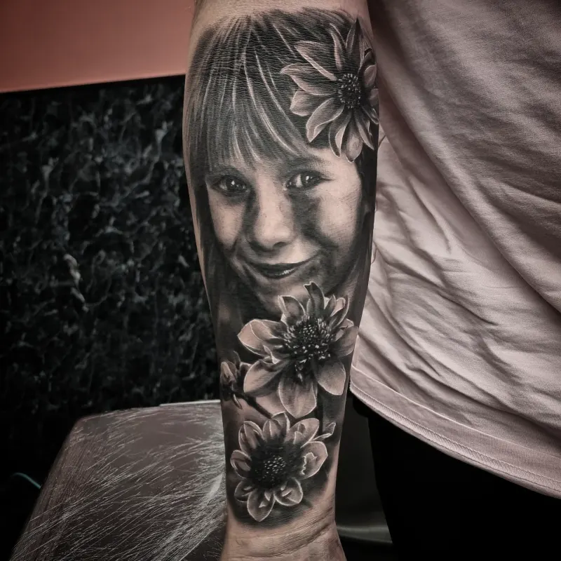 Black and grey realism portrait tattoo by Tomek Turlej, tattoo artist in Edinburgh