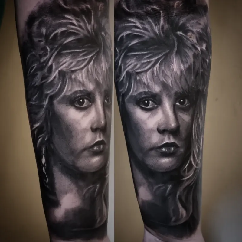 Black and grey realism portrait tattoo by Tomek Turlej, tattoo artist in Edinburgh
