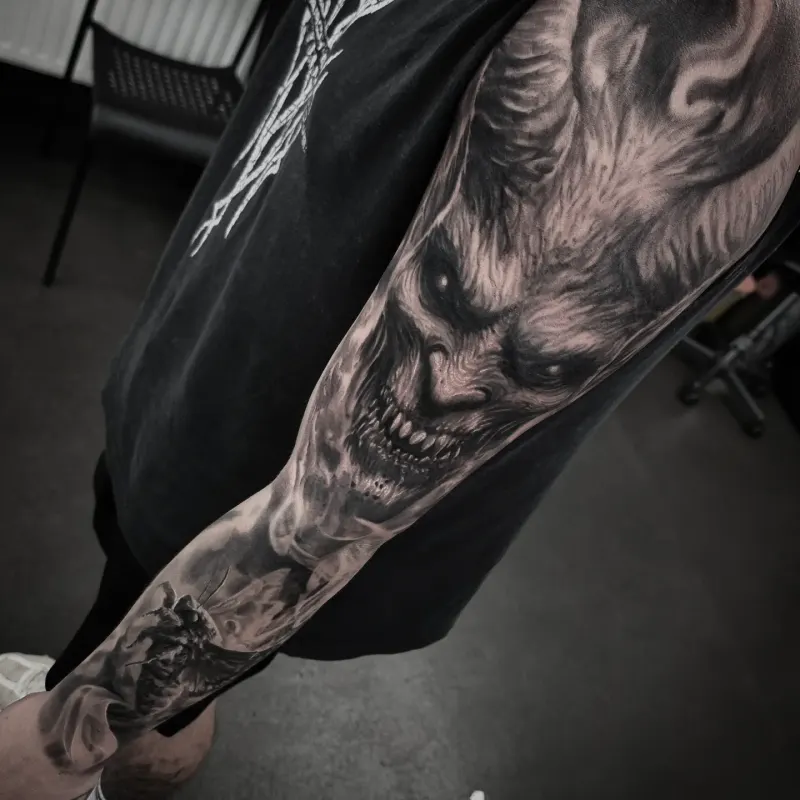 Full black and grey realism sleeve tattoo by Tomek Turlej, Edinburgh